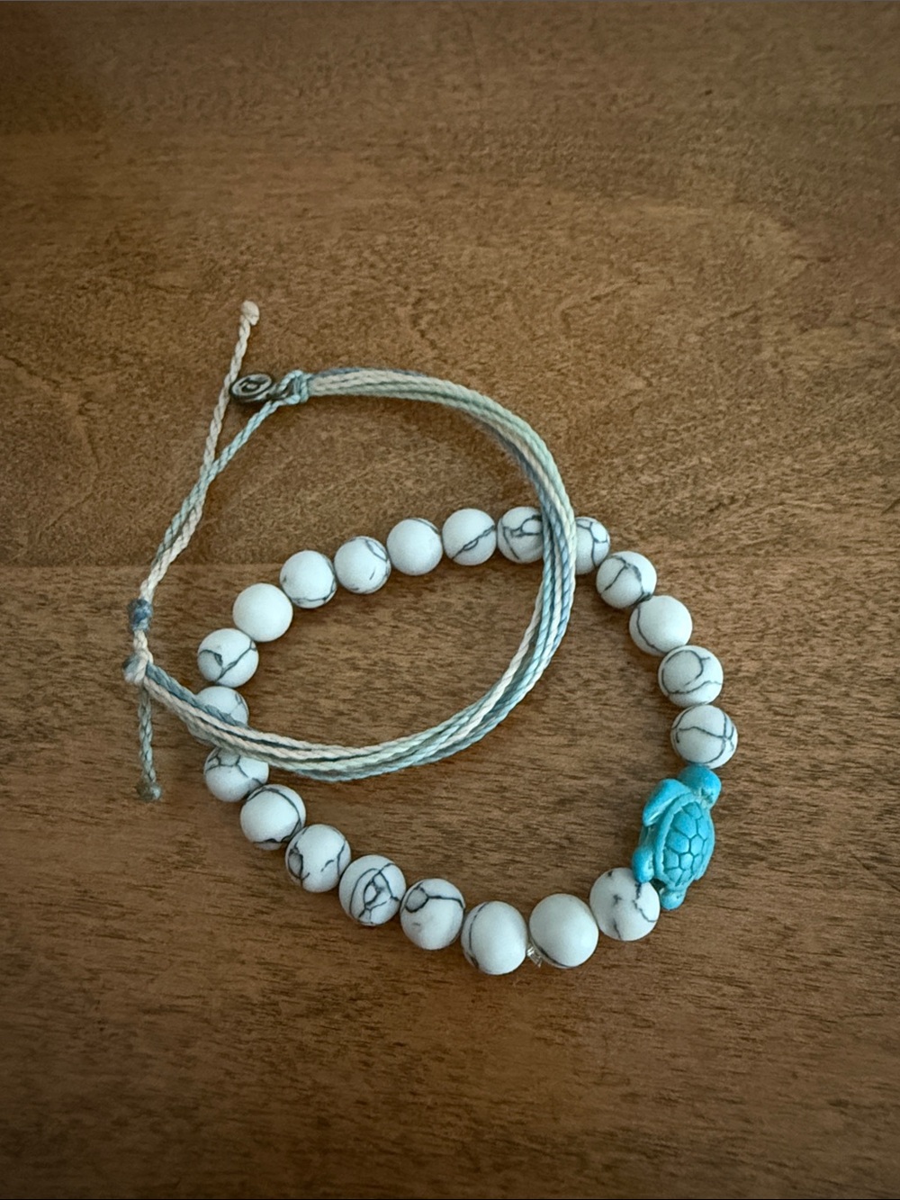 4 (scroll to next page) Vida White Howlite Beaded Bracelet with Turquoise Turtle